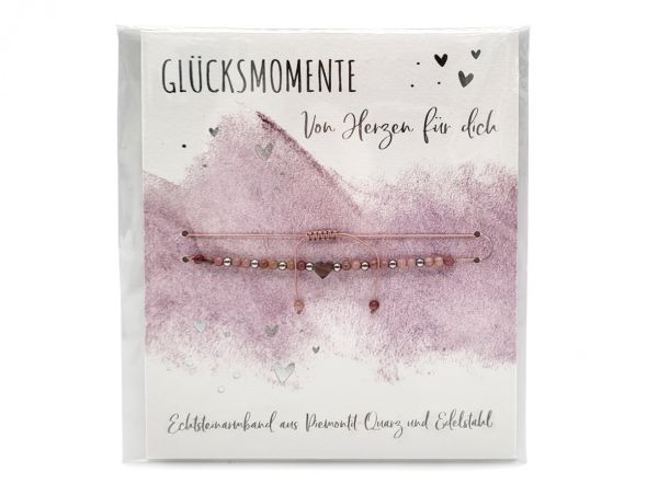 Edelstein-Armband in Rosa mit Herzanhänger aus Edelstahl. "Von Herzen für dich" steht auf der Verpackung.