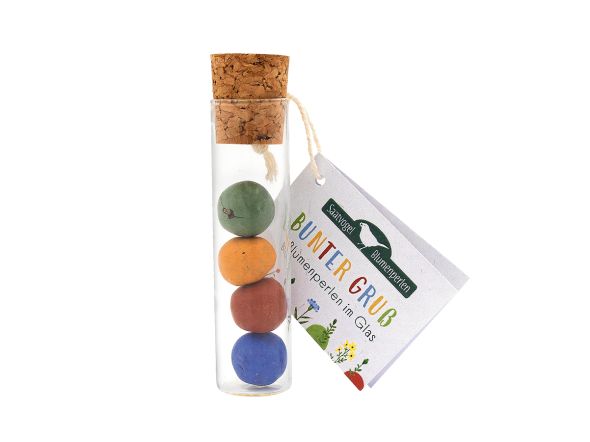 Blumenperlen im Glas, vier verschiedene Perlen in Grün, Gelb, Rot und Blau zum Aussäen